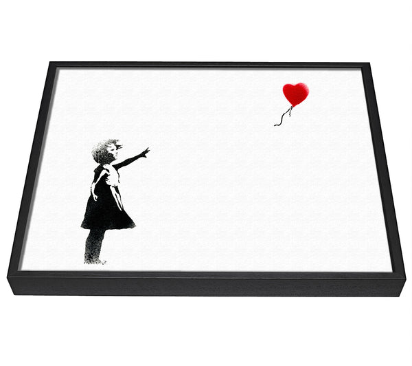 A picture of a Balloon Girl framed canvas print sold by Wallart-Direct.co.uk