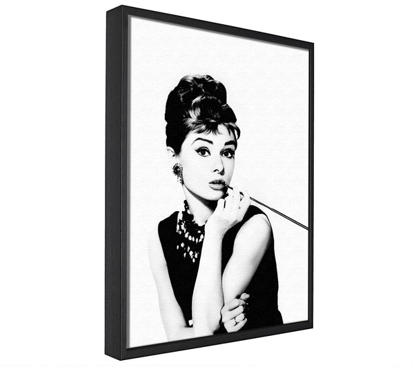 A picture of a Audrey Hepburn Cigarette framed canvas print sold by Wallart-Direct.co.uk