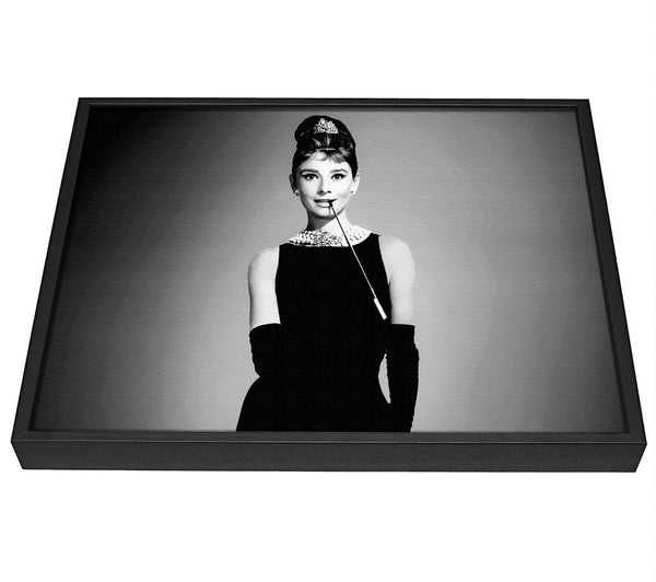 A picture of a Audrey Hepburn Cigarette Breakfast At Tiffanys framed canvas print sold by Wallart-Direct.co.uk