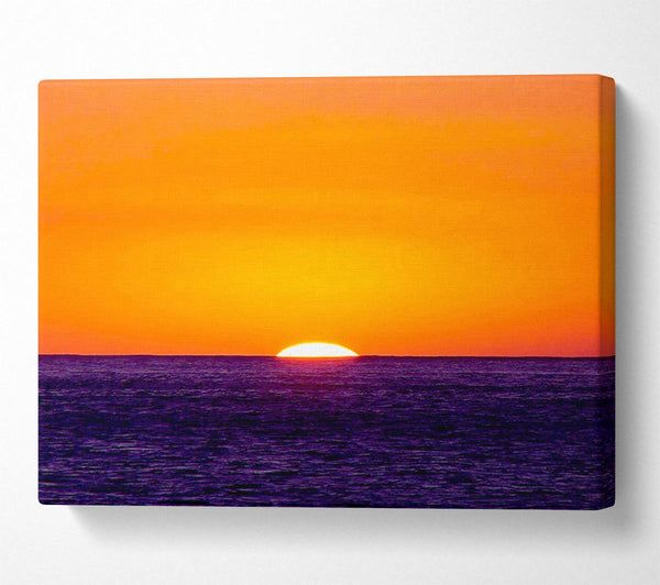 As The Sun Goes Down Over The Ocean Orange