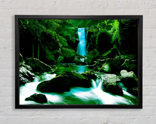 The Waterfall Flows Over The Rocks