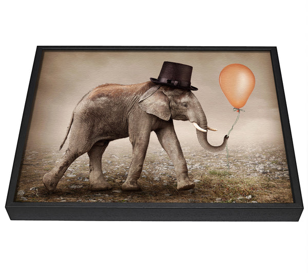 A picture of a Top Hat Elephant framed canvas print sold by Wallart-Direct.co.uk