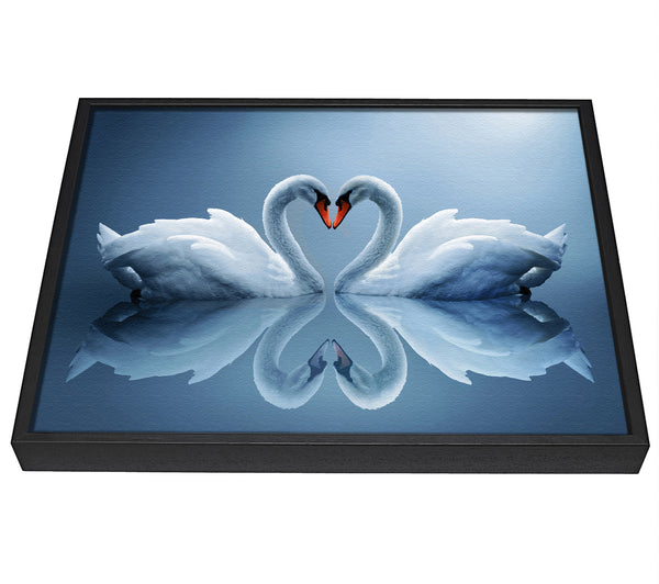 A picture of a Heart shaped Swans framed canvas print sold by Wallart-Direct.co.uk