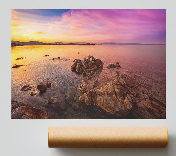 Pink Skies Over The Ocean Rocks