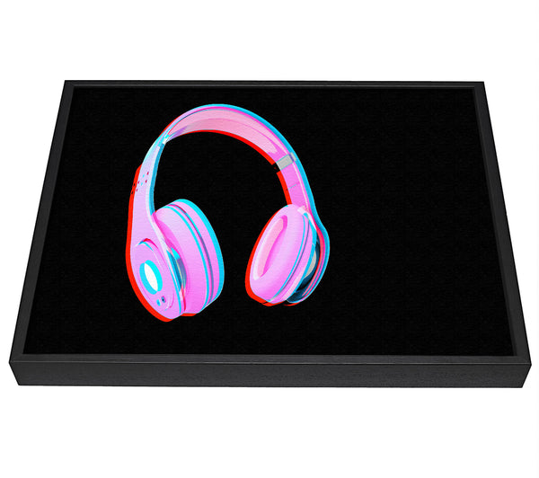 A picture of a Funky Pink Headphones framed canvas print sold by Wallart-Direct.co.uk