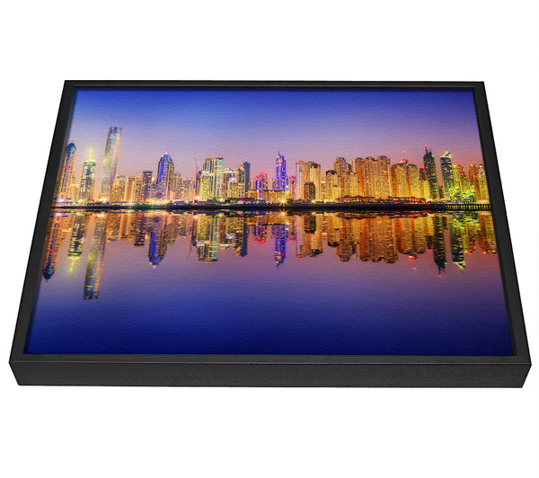 A picture of a Reflections Of The Colourful City By Night framed canvas print sold by Wallart-Direct.co.uk