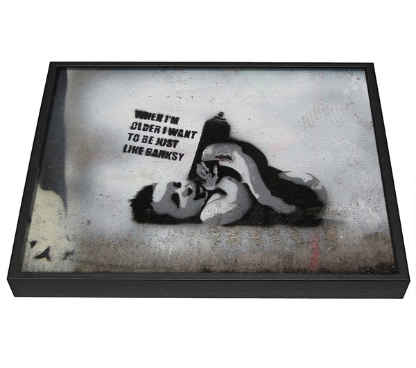 A picture of a Be like Banksy framed canvas print sold by Wallart-Direct.co.uk