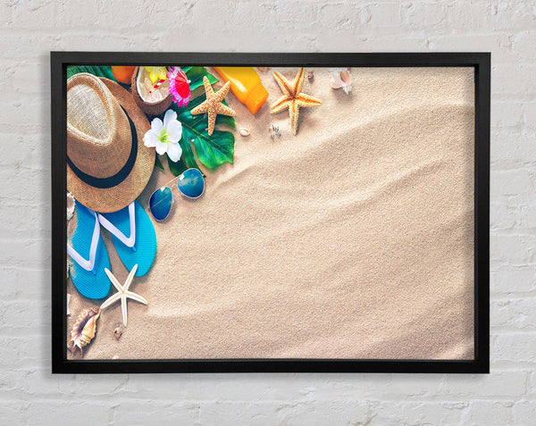 Sunglasses and hat on the beach