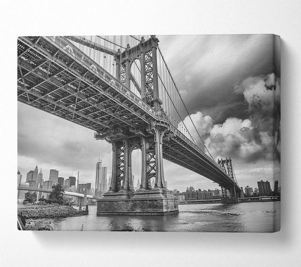 NYC black and white bridge under clouds