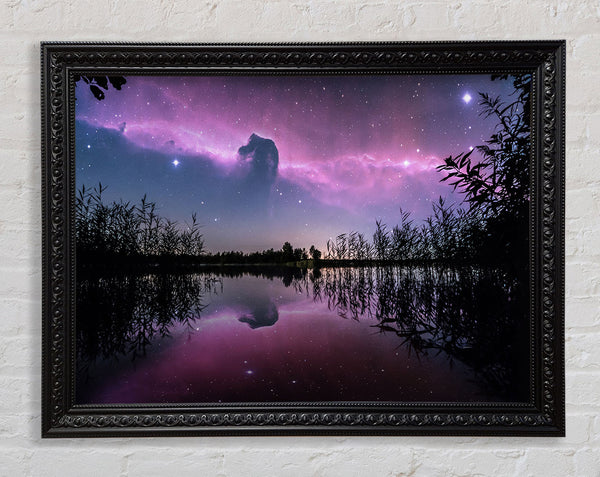 Horse head nebula over a purple lake