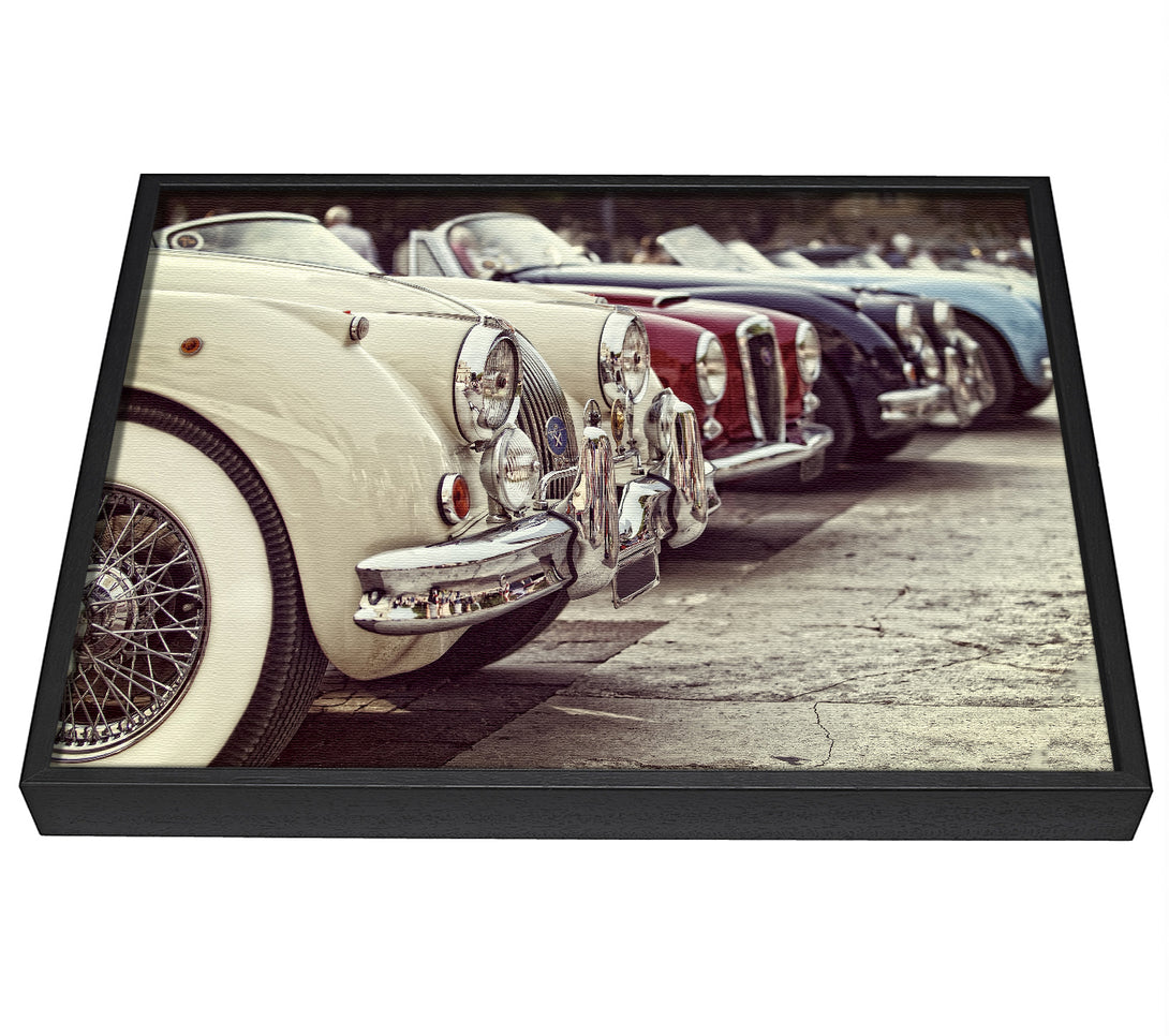 A picture of a Classic Cars In A Row framed canvas print sold by Wallart-Direct.co.uk