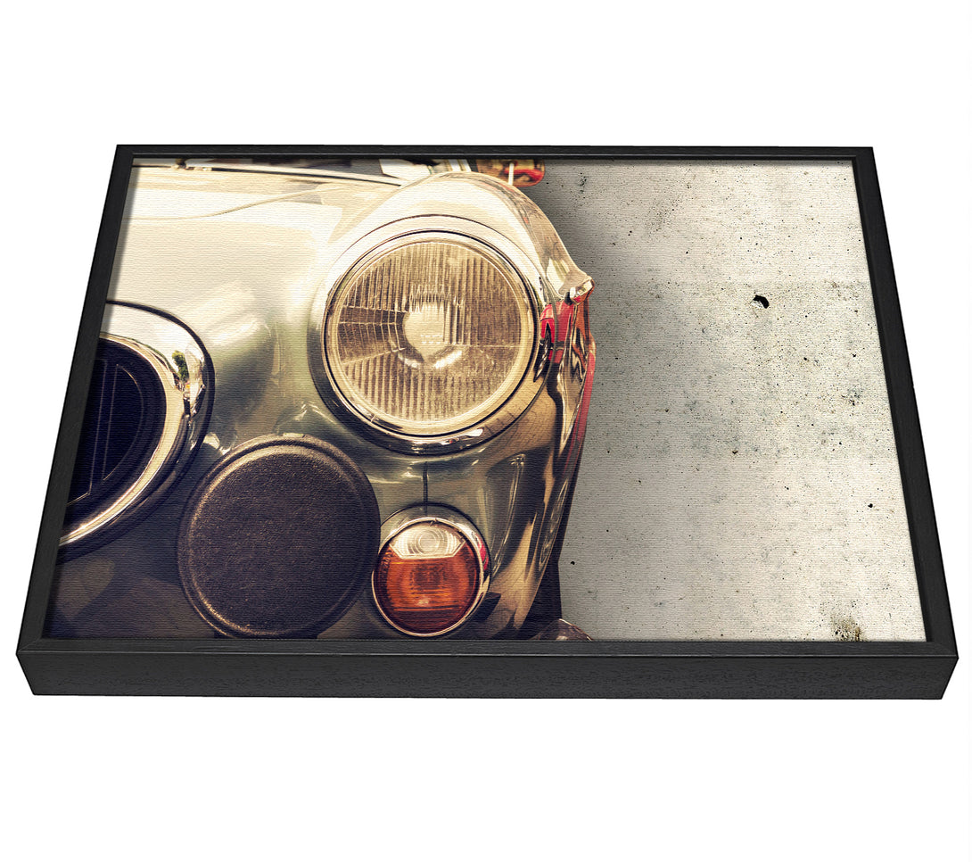 A picture of a Close Up Classic Headlight framed canvas print sold by Wallart-Direct.co.uk