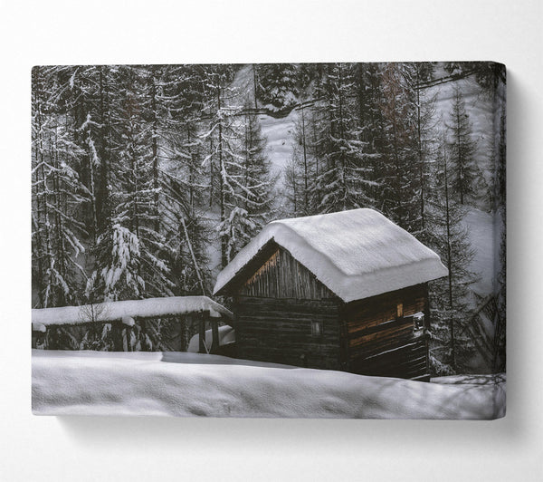 White Cabin Under Snow