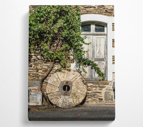 Stone Wheel And Vines