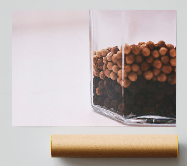 Brown Peppercorns In Glass