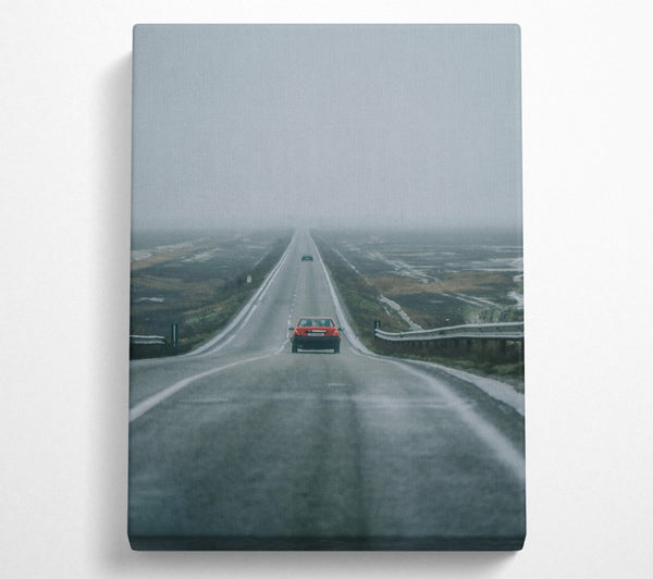 Red Car Through Foggy Road