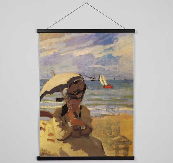 Monet Camille Monet On The Beach At Trouville Hanging Poster - Wallart-Direct UK