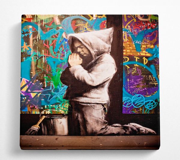 A Square Canvas Print Showing Graffiti Pray Square Wall Art