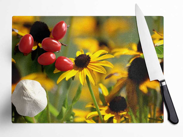 Yellow Flowers In The Garden Glass Chopping Board