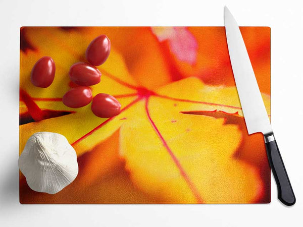 Orange Winter Leaf Glass Chopping Board