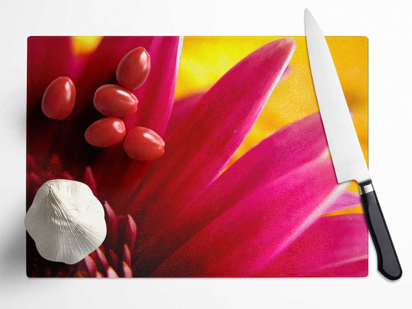 Vibrant Pink Petals On Yellow Glass Chopping Board