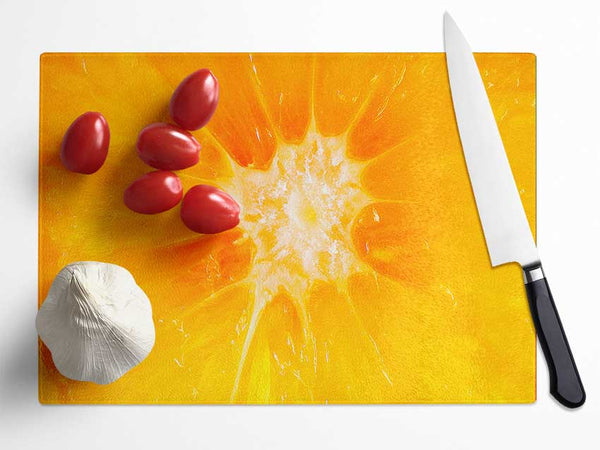 The Centre Of An Orange Glass Chopping Board