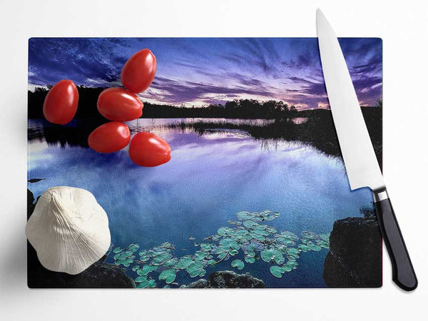 Calm Dusk Water Lily pads Glass Chopping Board