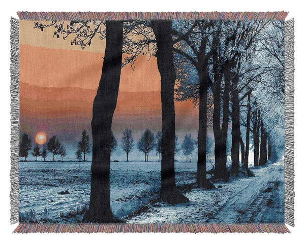 Winter Landscape With Orange Sky Woven Blanket