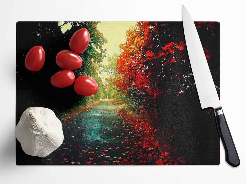 Red Trees On The Autumn path Glass Chopping Board