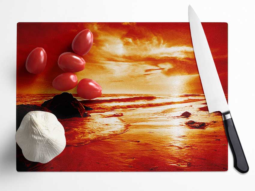 Orange Ocean Boulders Glass Chopping Board