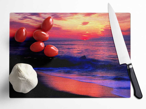 Stunning Red Distant Sun Ocean Glass Chopping Board