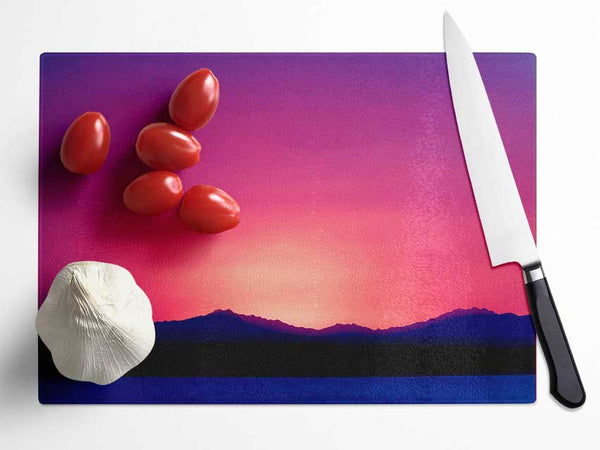 Pink Sunset Skies Glass Chopping Board