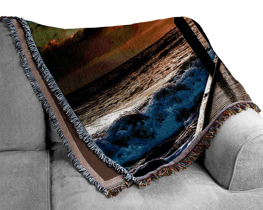 Waves Crashing On The Pier At Sunset Woven Blanket