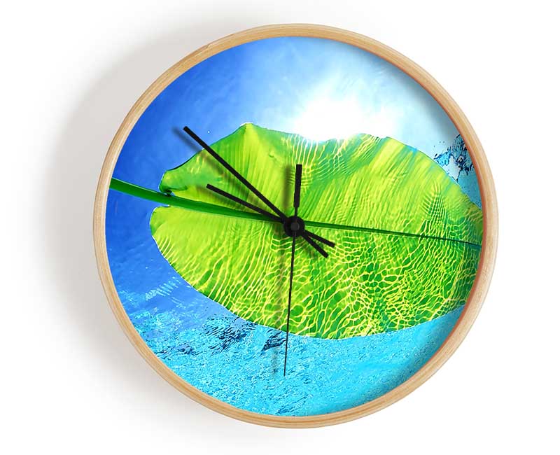 Blue Waters Of A Green Leaf Clock - Wallart-Direct UK