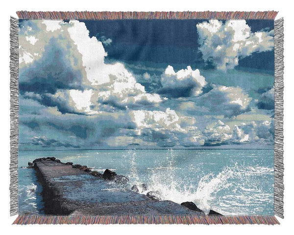 Gentle Waves Crashing In The Cloud Filled Sky Woven Blanket