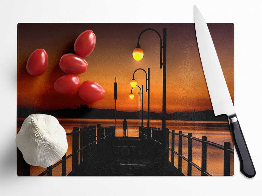 Pier Sunset Orange Glass Chopping Board