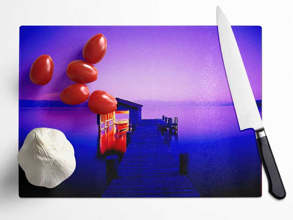 Tranquil Lake Boat House Purple Glass Chopping Board