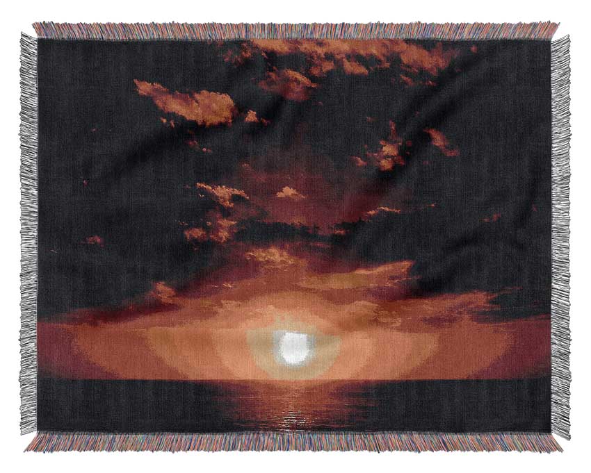 Sunset Through The Black Ocean Clouds Woven Blanket