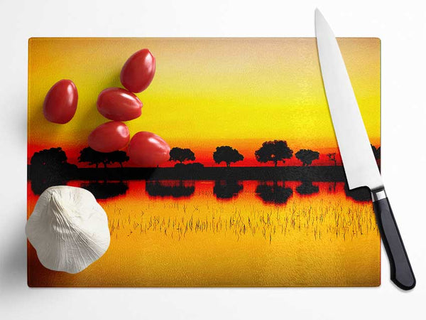 Reflections Of The Sunset Trees Golden Glass Chopping Board