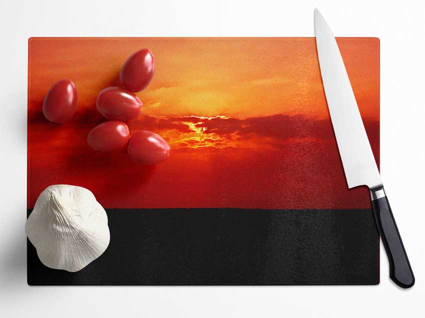 Red Sunbeams Over The Black Ocean Glass Chopping Board