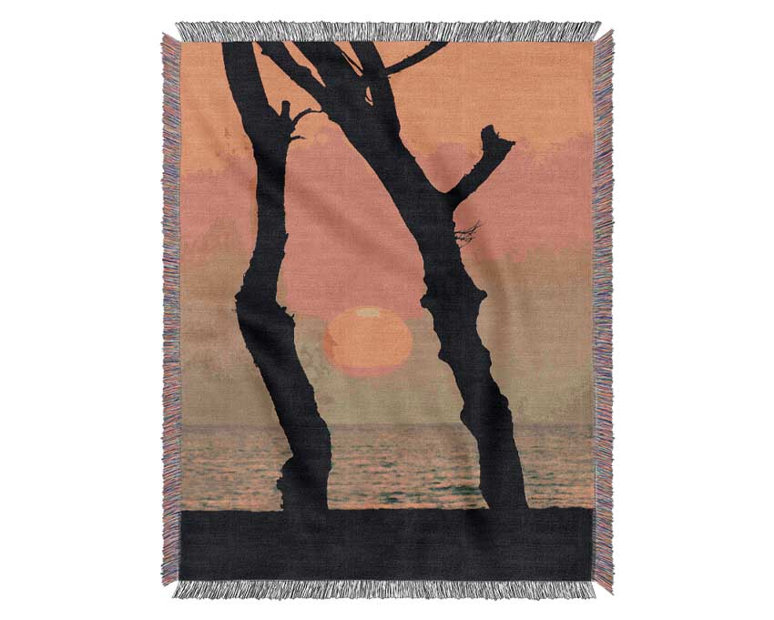 Red Sun Through The Ocean Trees Woven Blanket