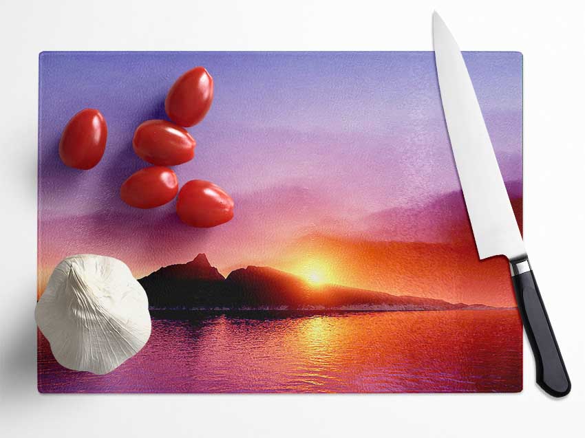 As The Sun Peeps Over The Mountain Ocean Glass Chopping Board