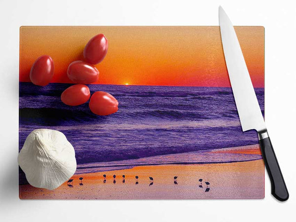 As The Sun Sets Over The Ocean Glass Chopping Board