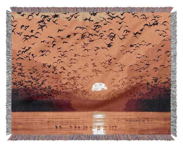 The Birds In The Golden Sunset Woven Blanket