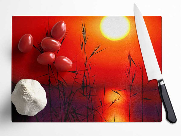 Sun Through The Red Reeds Glass Chopping Board