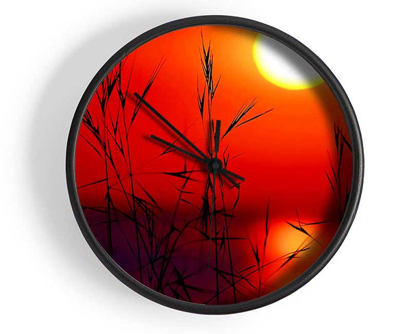 Sun Through The Red Reeds Clock - Wallart-Direct UK