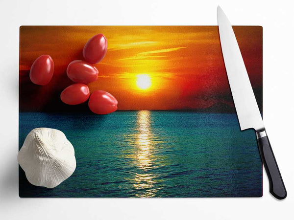 As The Sun Goes Down Over The Turquoise Ocean Glass Chopping Board