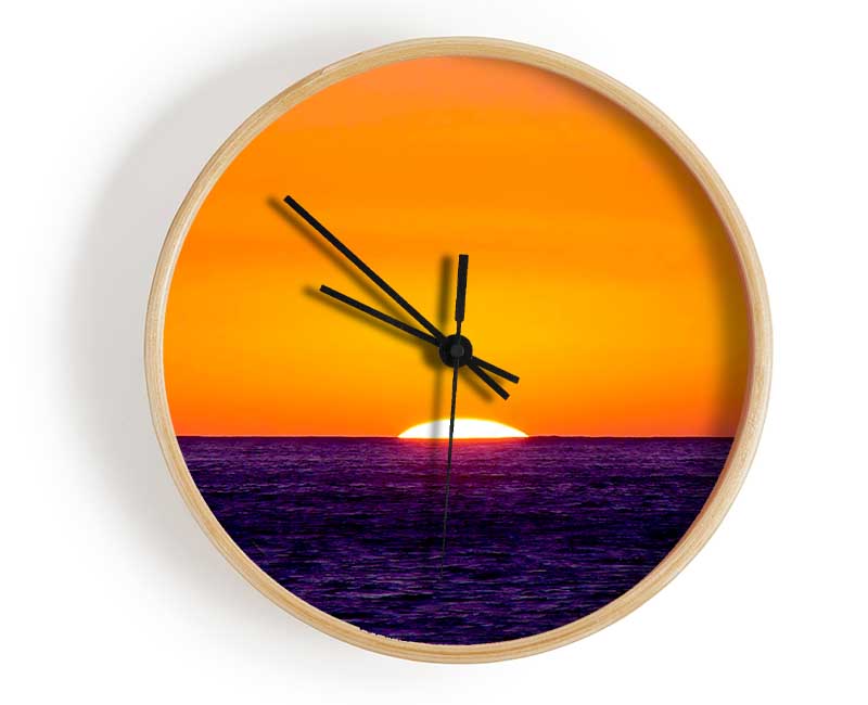 As The Sun Goes Down Over The Ocean Orange Clock - Wallart-Direct UK