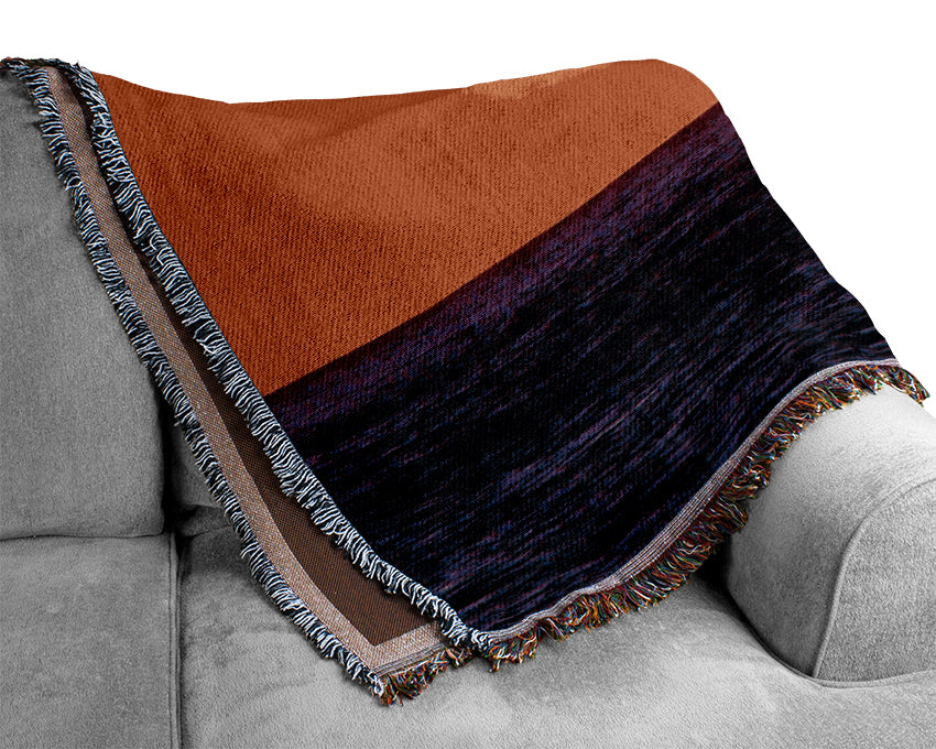 As The Sun Goes Down Over The Ocean Orange Woven Blanket