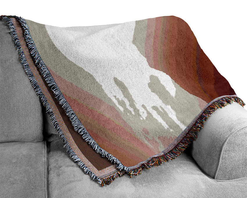 The Suns Mauve Ocean Rocks Woven Blanket